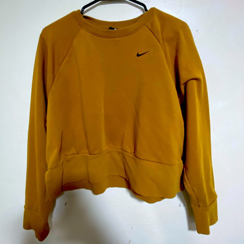 Mustard yellow Nike sweater. Ventilation in back.